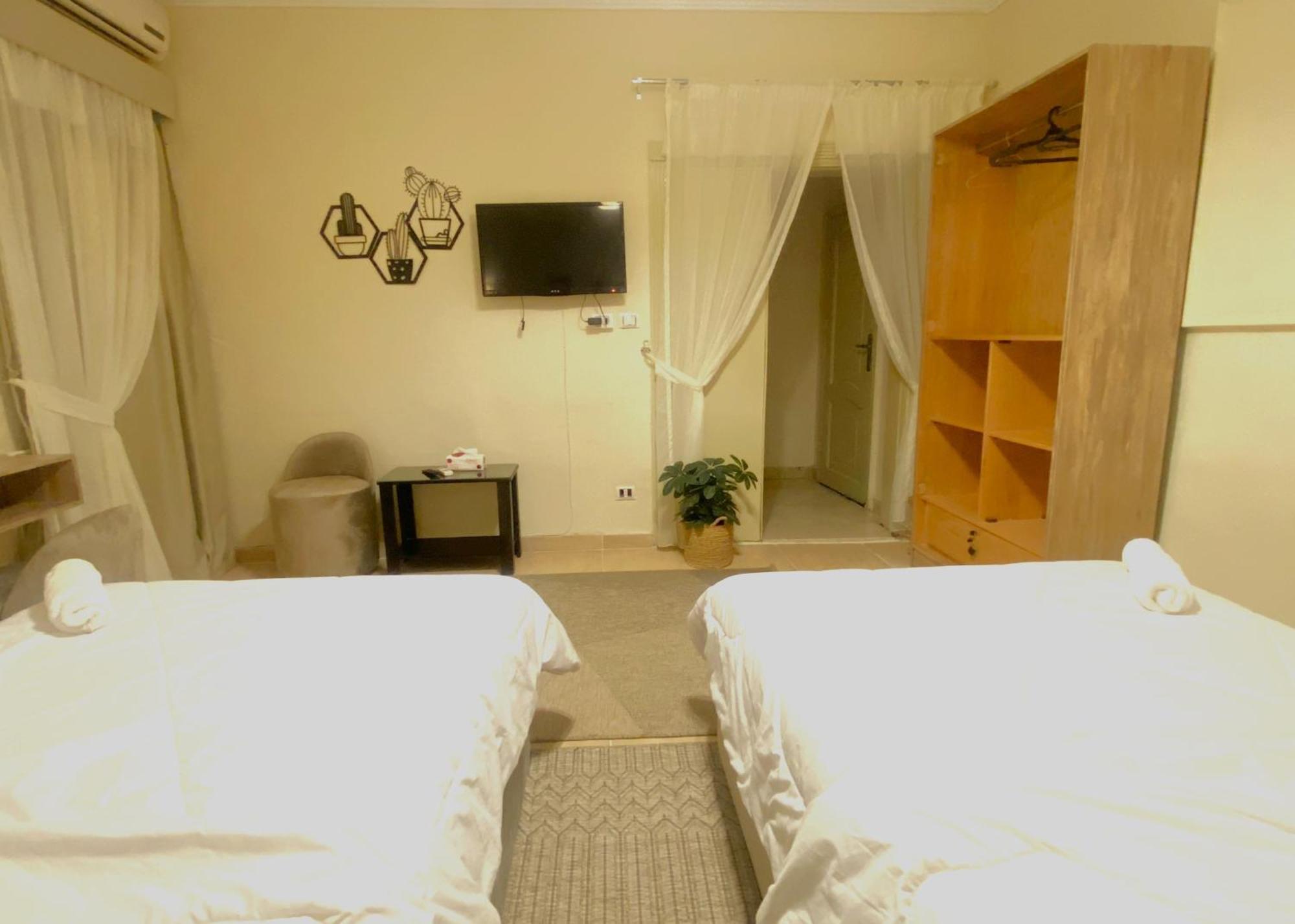 Seven Pyramids Panoramic View Inn Kafret el-Gabal Стая снимка